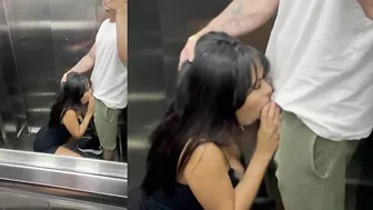 Brunette Giving a Blowjob in an Elevator